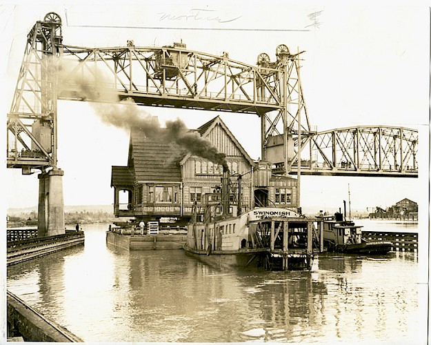 The Weyerhaeuser Building was barged up the Snohomish River from Mill A to Mill B in 1938.